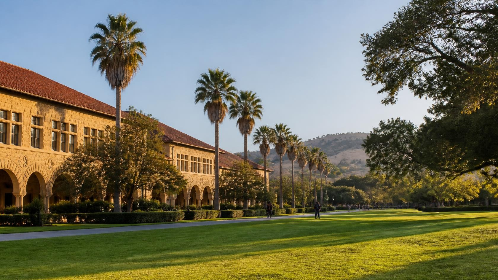Sandstone arcades, palms, and green lawns near Palo Alto illustrating Stanford PA prerequisites planning
